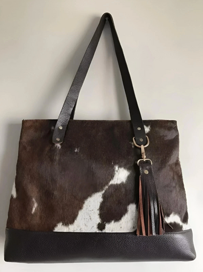 Brown white cowhide bag with fringe tassel