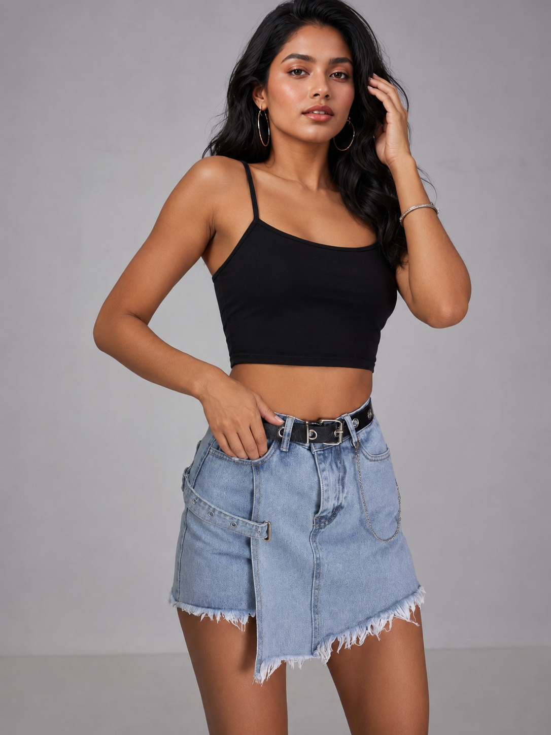 Asymmetrical denim mini skort with frayed hem