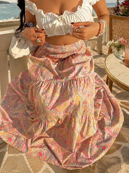 Smocked waist maxi skirt with tiered paisley print