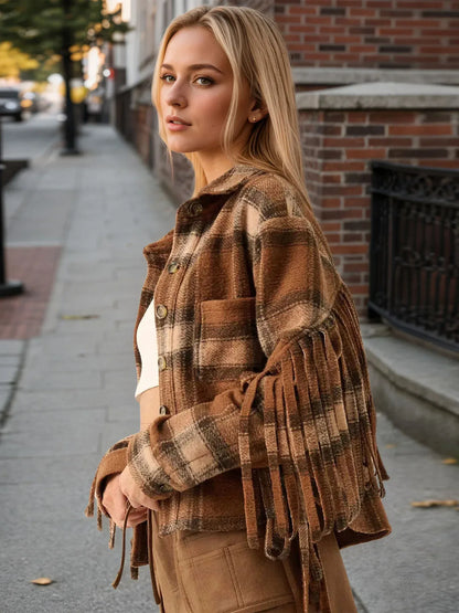 Cowgirl fringe jacket women in brown plaid with cropped length, long tassel fringe, relaxed fit and button front.