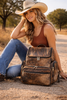 Dark brown hair-on cowhide mommy backpack
