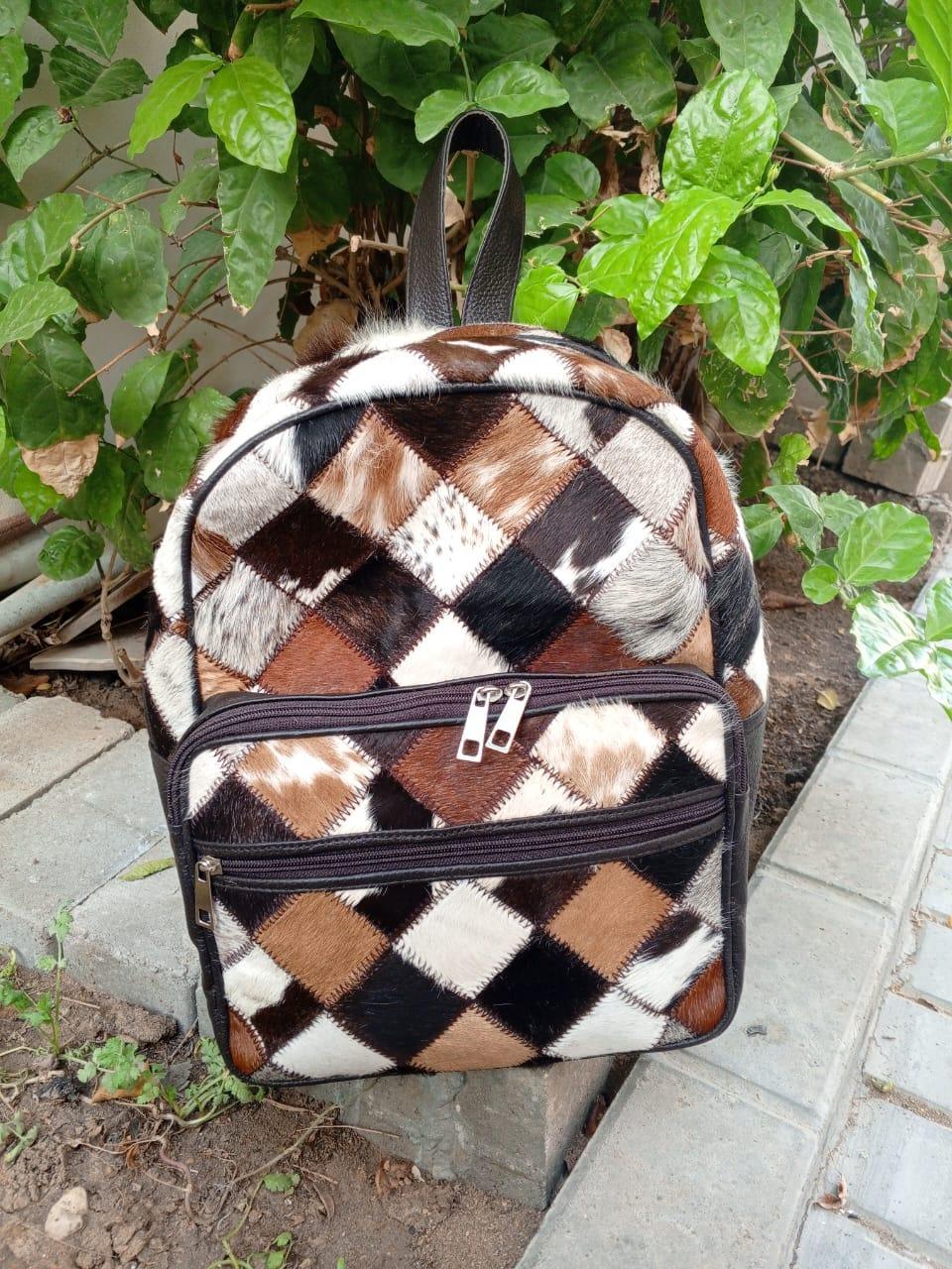 Hair On Cowhide Patchwork Leather Backpack
