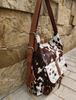 Cowhide backpack purse shoulder bag
