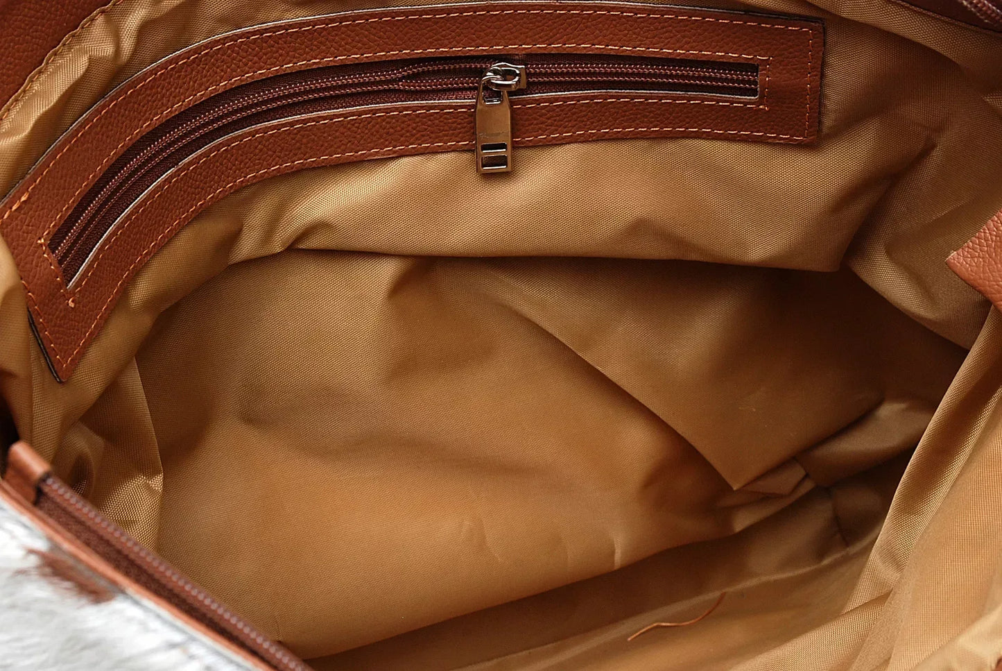Brown and White Cowhide Tote Bag with Leather Handles