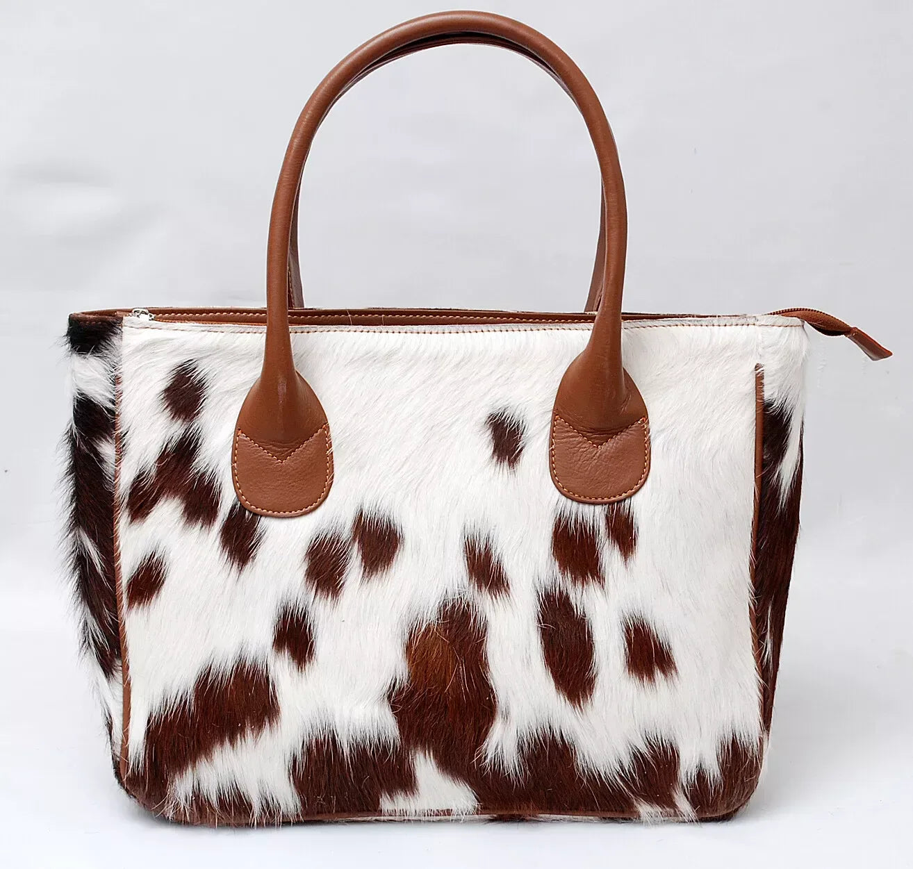 Brown and White Cowhide Tote Bag with Leather Handles