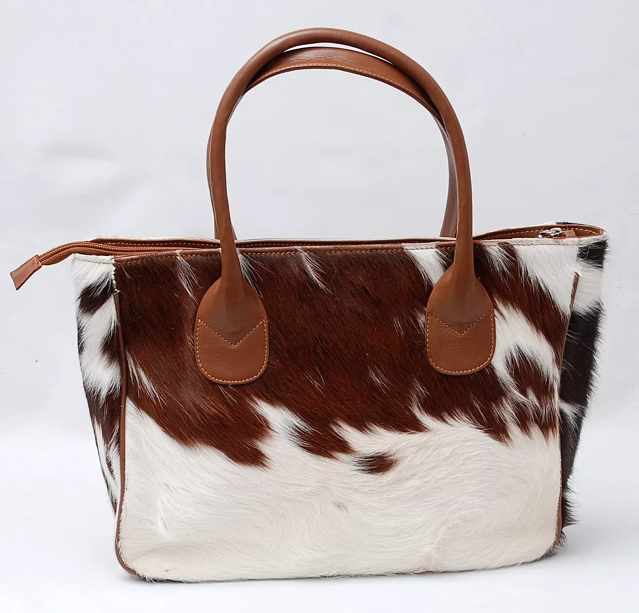 Brown and White Cowhide Tote Bag with Leather Handles