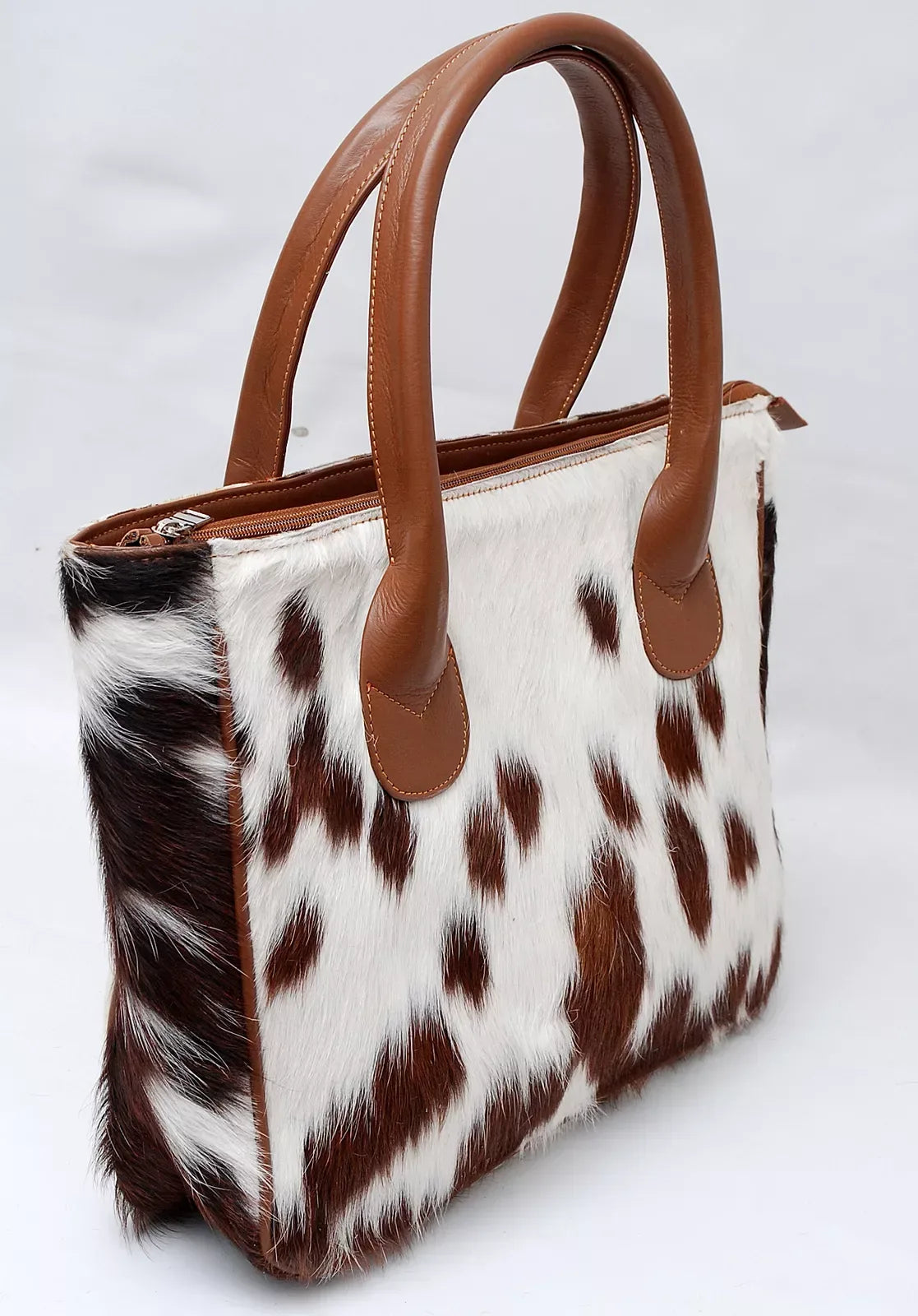 Brown and White Cowhide Tote Bag with Leather Handles
