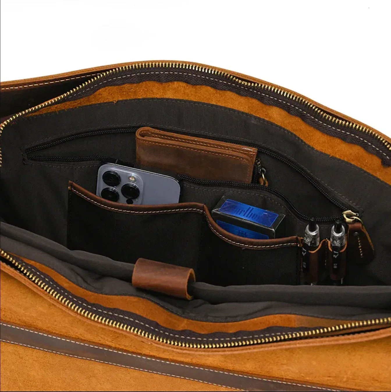 Crazy horse leather briefcase with rich brown full grain leather, organized laptop interior, front pockets and metal buckles.