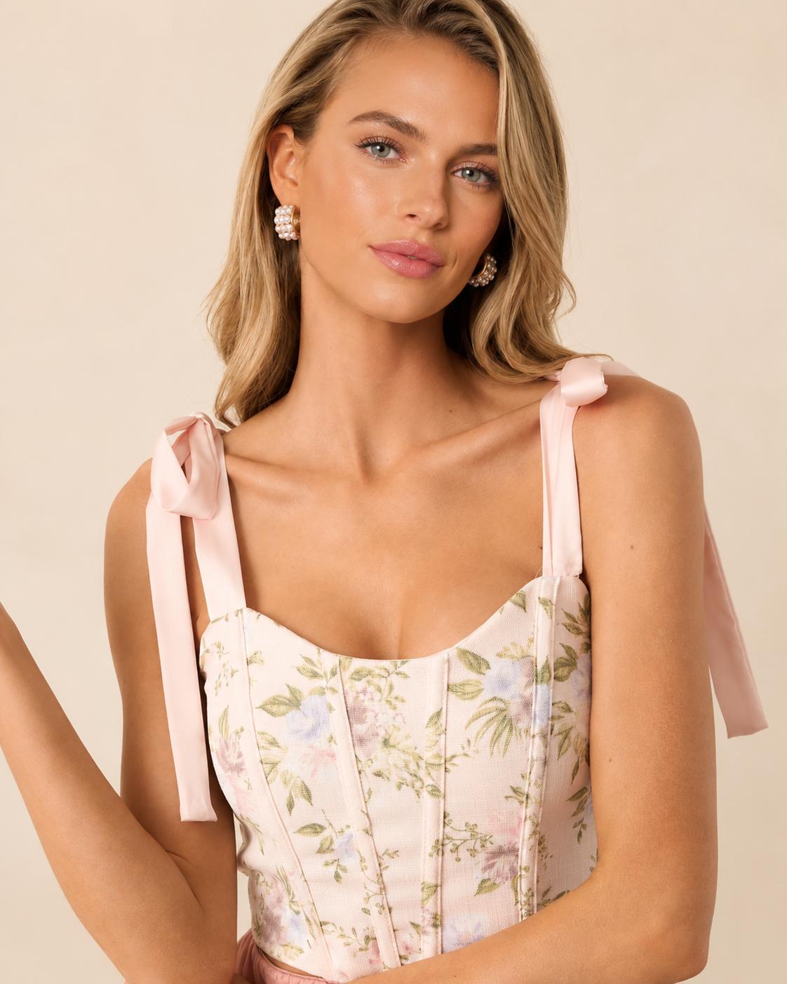 Corset top with floral print tie straps and lace up back