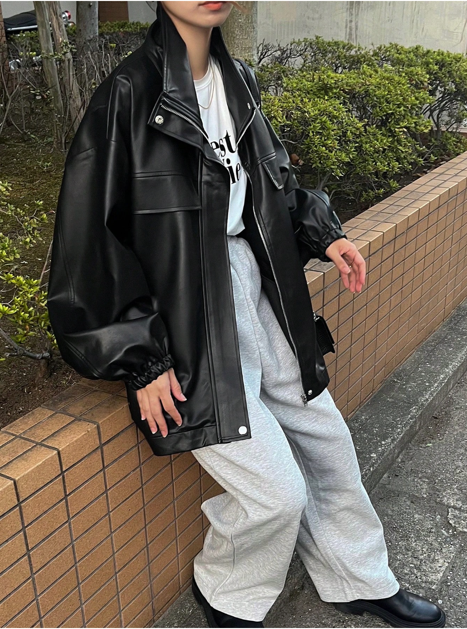 Women's oversized leather jacket in genuine black, loose casual fit throughout