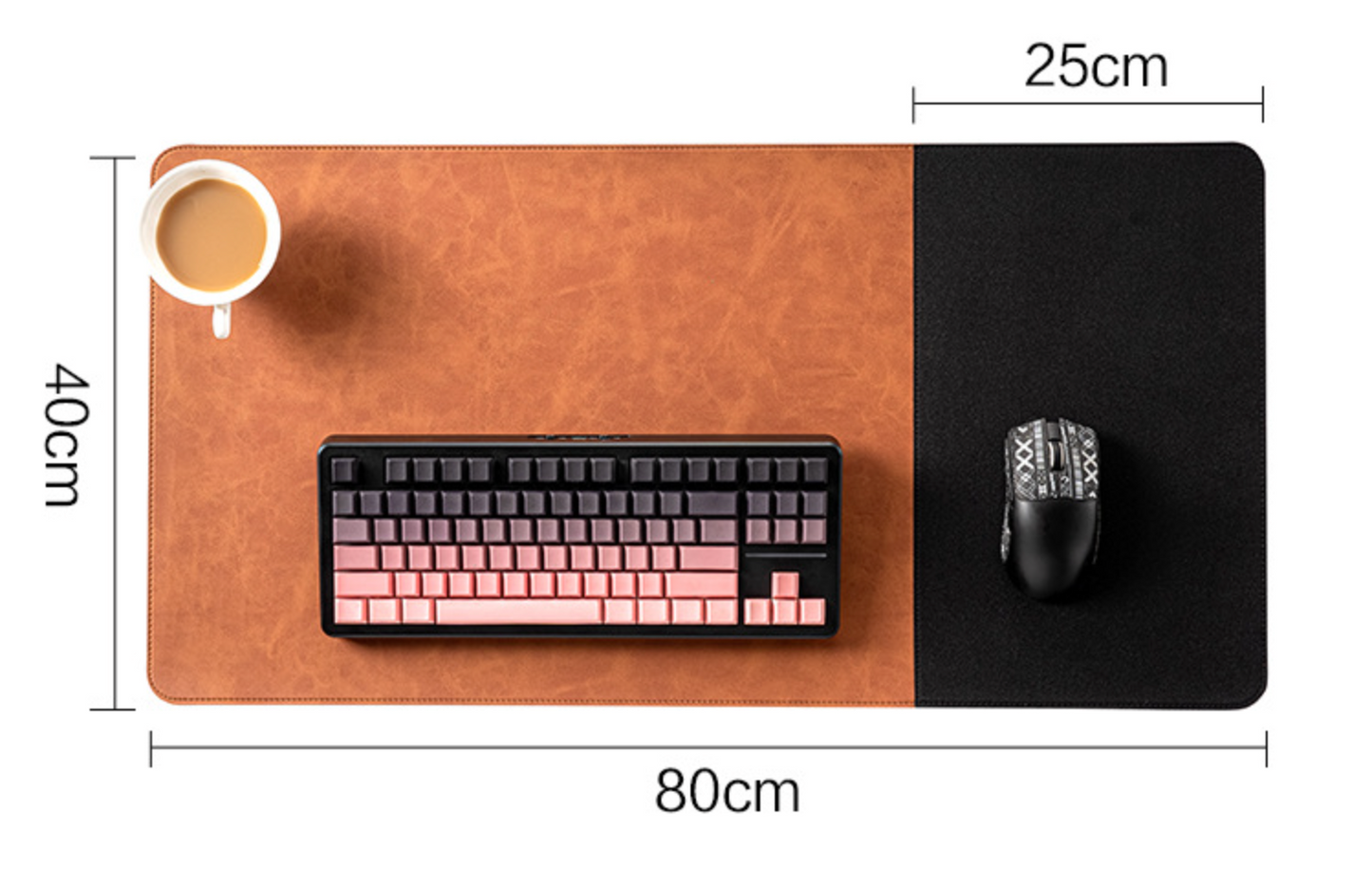 Top-down desk mat with dimension labels showing 80cm length, 40cm width, and a 25cm section. The desk mat is split into an orange left half and a black right half, with a keyboard and mouse placed on top, plus a coffee cup on the orange side.