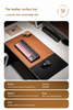 A promotional graphic for a large leather desk pad and mouse pad set. The top section contains marketing text describing the smooth leather surface, and the bottom section lists product details including thickness (2.