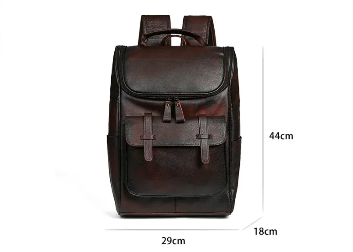 Leather laptop backpack for men in dark brown cowhide with organized storage, front compartments, and adjustable shoulder straps.