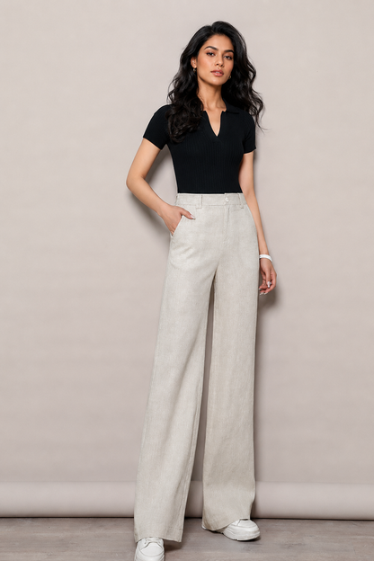 Linen wide leg pants with high waist, side pockets, and long straight fall