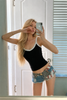 Low rise denim shorts with flag print and frayed hem