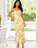 Maxi dress with thin straps, fitted bodice, and soft flared hem.