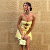 Strapless knot front yellow mini dress