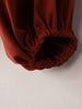 Women’s V-Neck Lantern Sleeve Blouse with Fitted Waist and Button Detail