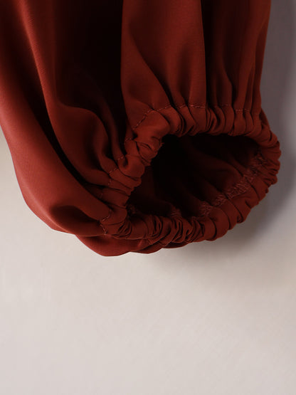 Women’s V-Neck Lantern Sleeve Blouse with Fitted Waist and Button Detail