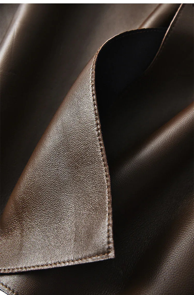 High waisted midi leather skirt with front slit and pockets