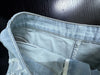 High waisted denim shorts with frayed light wash hem