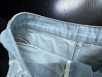 High waisted denim shorts with frayed light wash hem