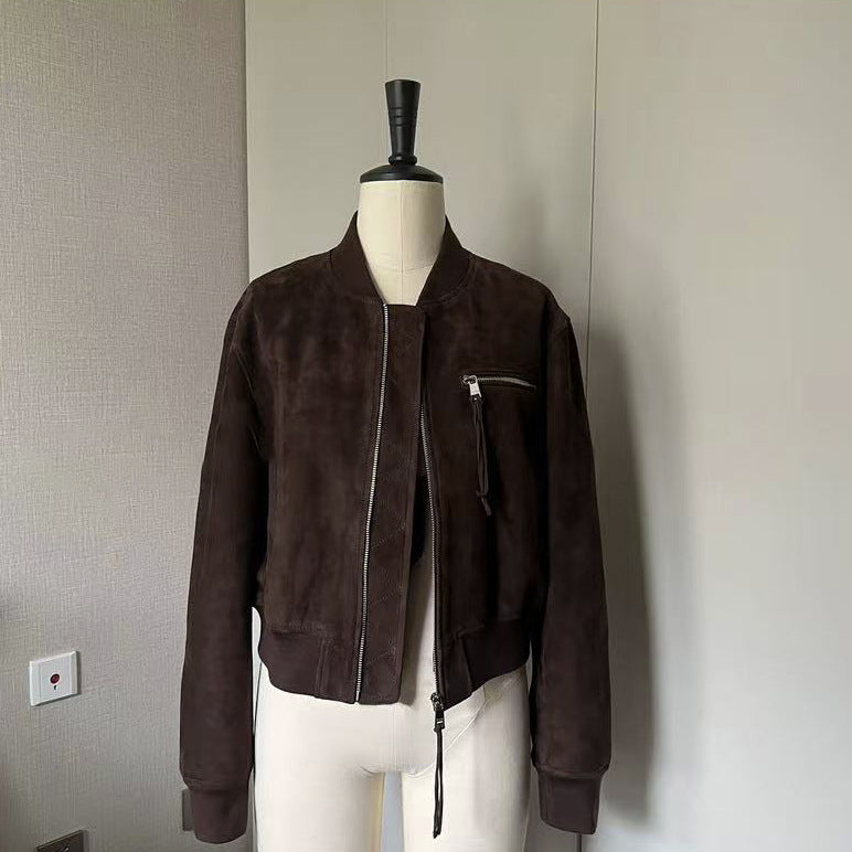 Premium goat suede leather bomber jacket for women. Cropped motorcycle design with secure zipper pockets, made for autumn layering and winter wear.
