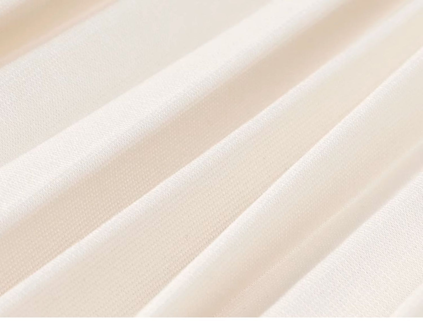 White pleated mesh skirt with elastic waistband