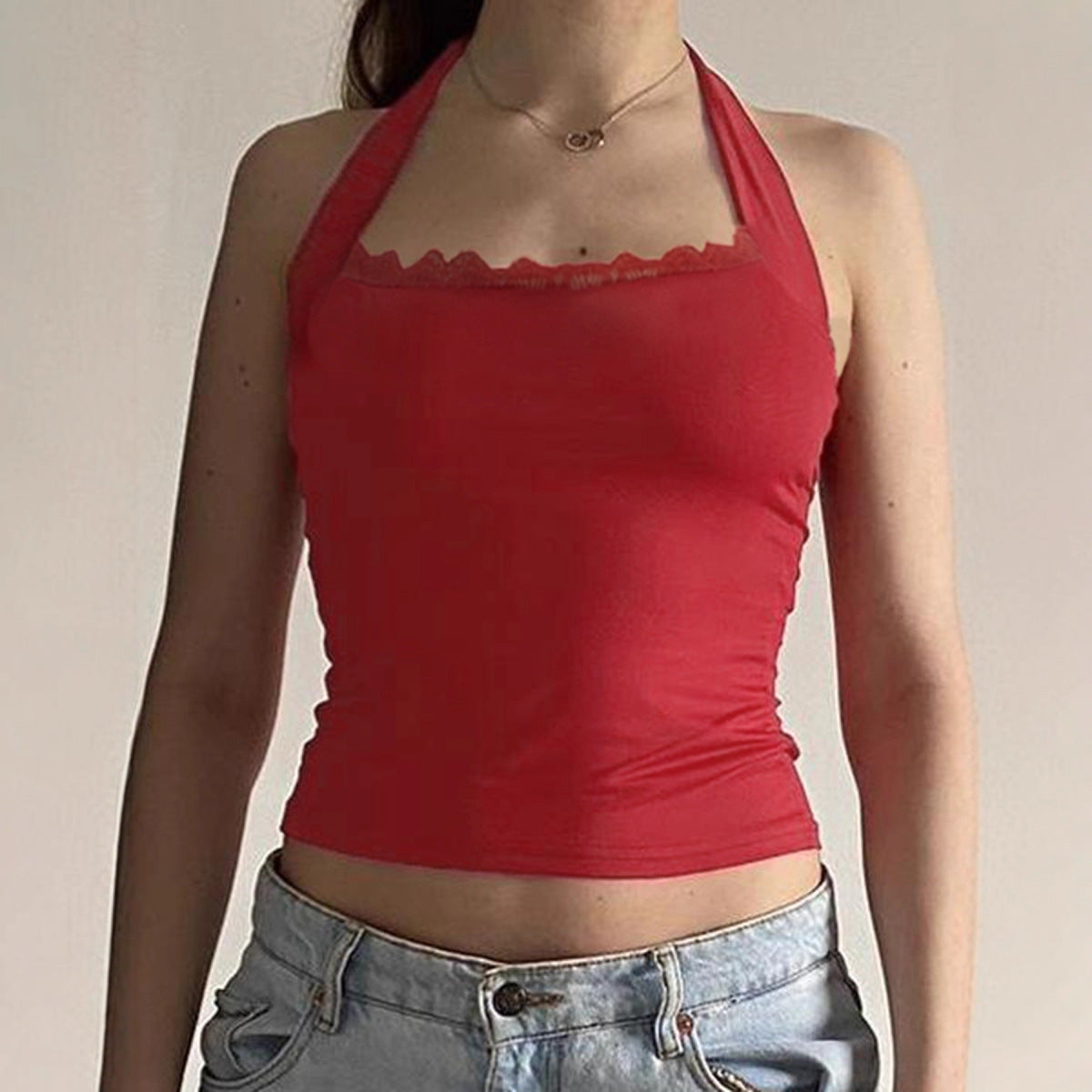 Women halterneck vest with lace trim neckline