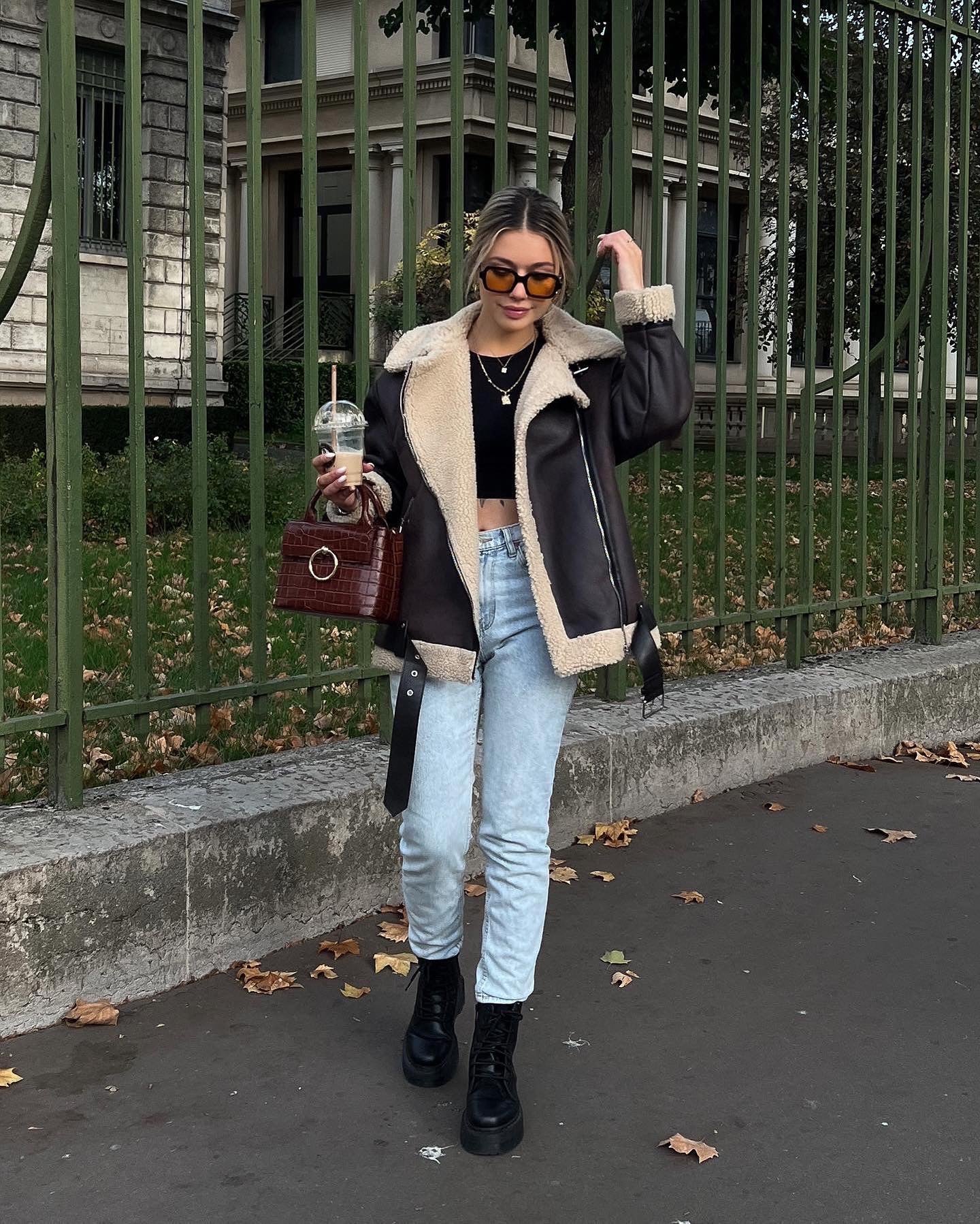 Brown shearling jacket with faux leather zip details