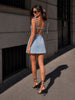 Light blue denim mini dress with tie straps and open back