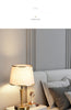 Modern Scandinavian brass table lamp with linen shade