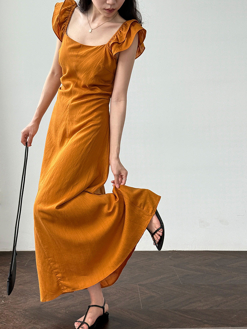 White flutter sleeve linen maxi dress with open back waist fit