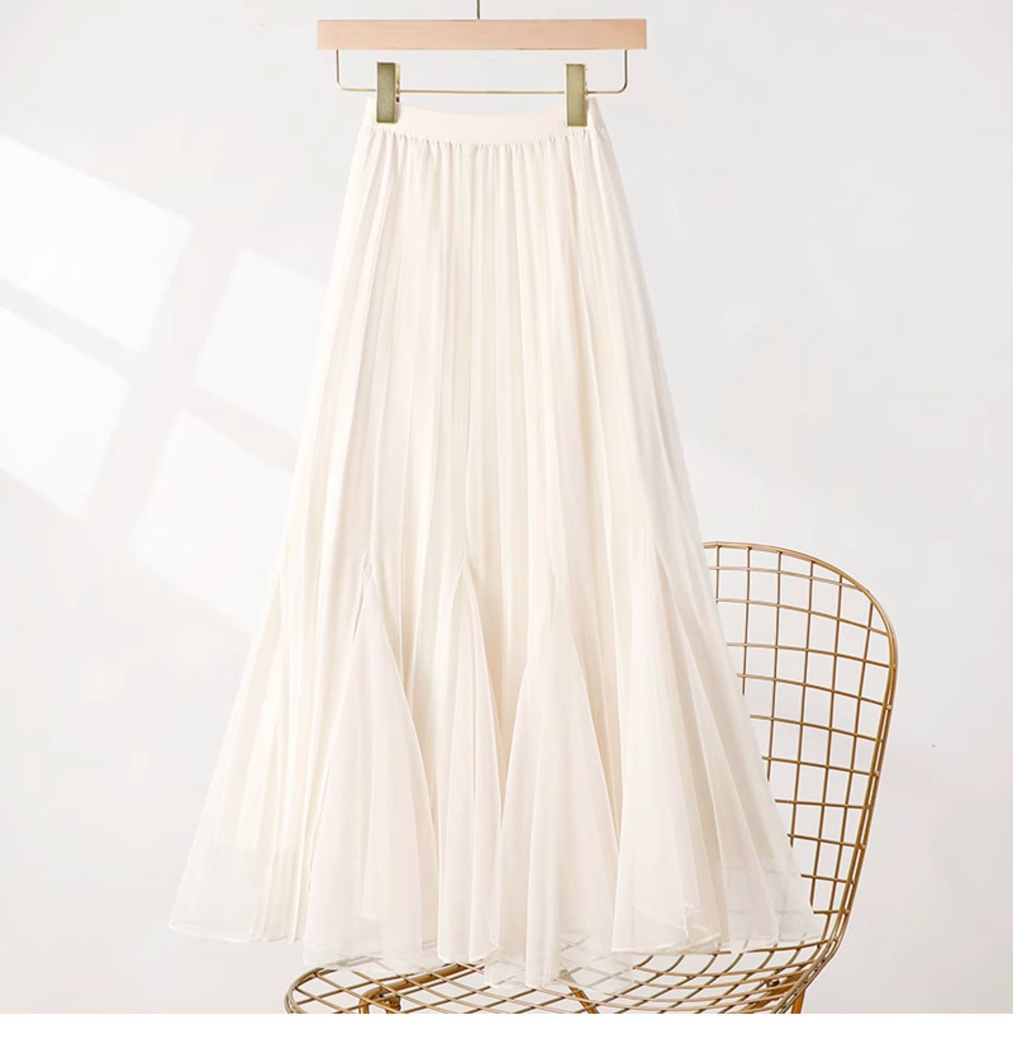 White pleated mesh skirt with elastic waistband