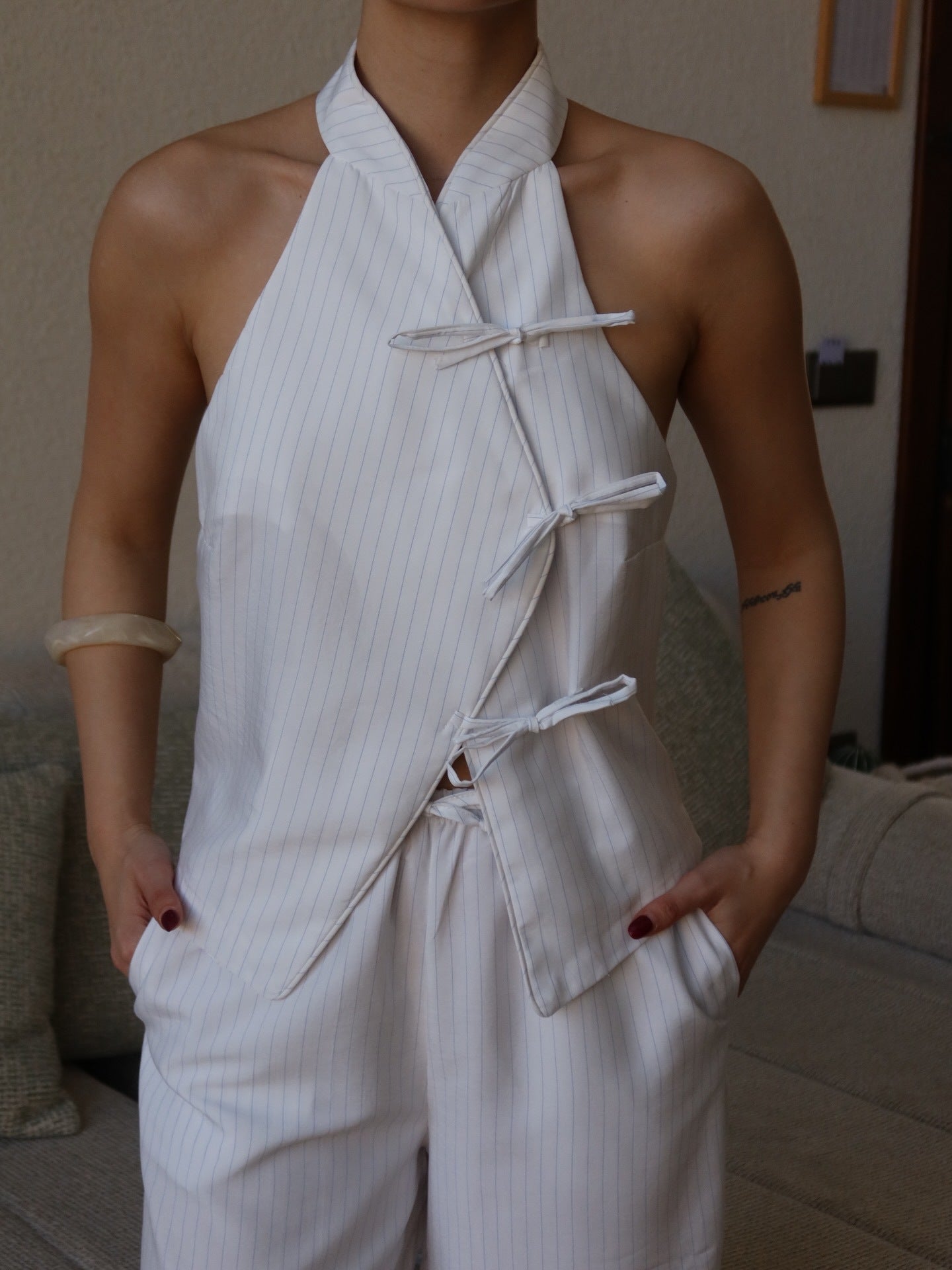 White pinstripe tie front halter vest and wide leg pants set