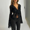 Sheer black chiffon ruffle tie blouse