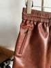 Genuine sheepskin leather mini skirt with drawstring