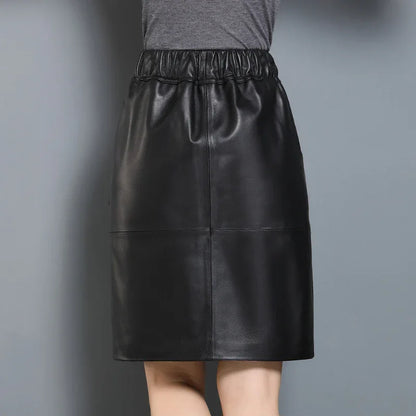 Black elastic waist leather midi skirt with pockets