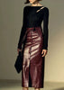 Long leather skirt for women made from waxed sheepskin. High waisted fit with lace-up belt and front slit. Perfect midi leather skirt for every occasion.