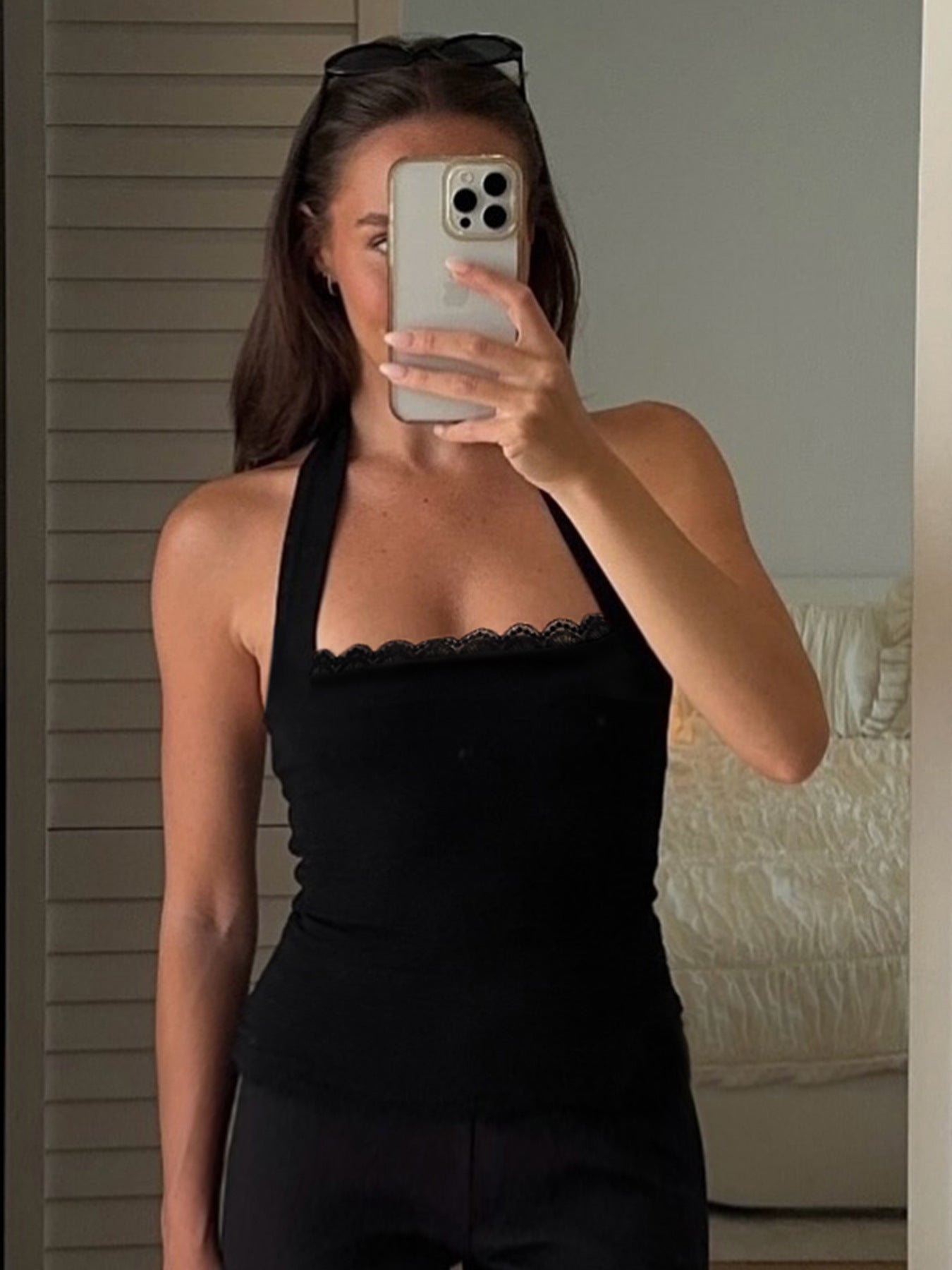 Women halterneck vest with lace trim neckline