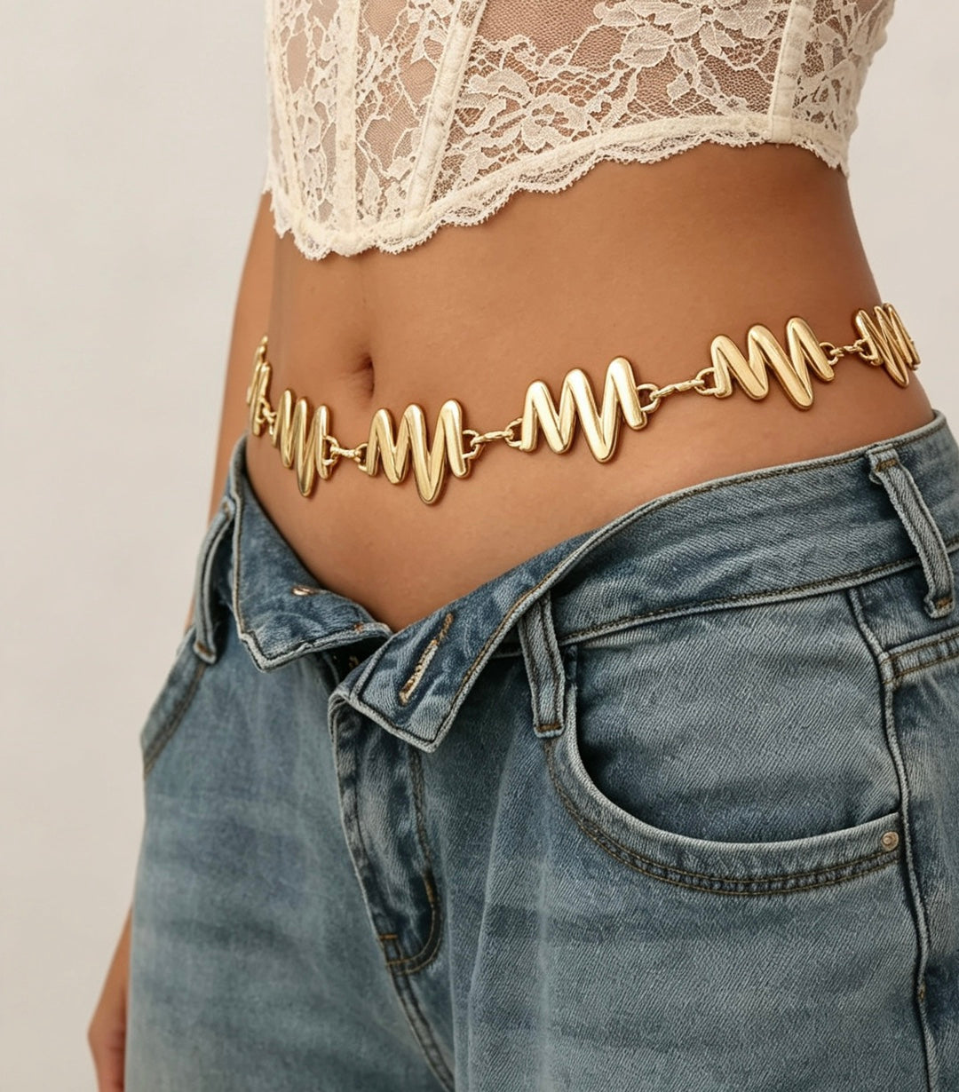Gold Waist Chain with Sculptural Wave Pattern for Women