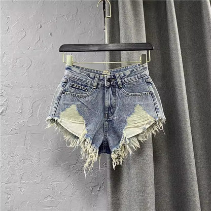 Women ripped denim shorts with fringe