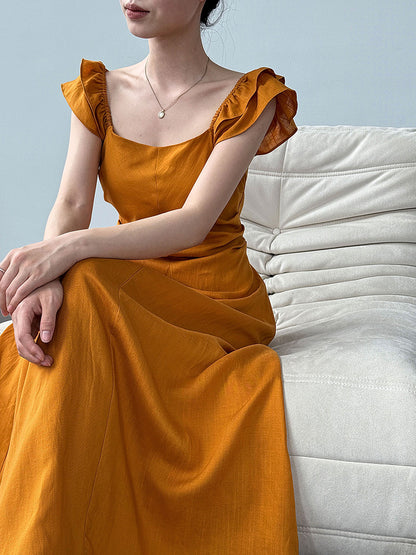 White flutter sleeve linen maxi dress with open back waist fit
