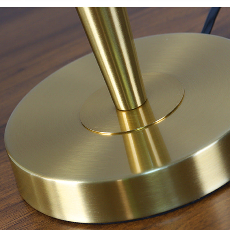 Modern Scandinavian brass table lamp with linen shade