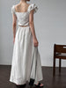 White flutter sleeve linen maxi dress with open back waist fit