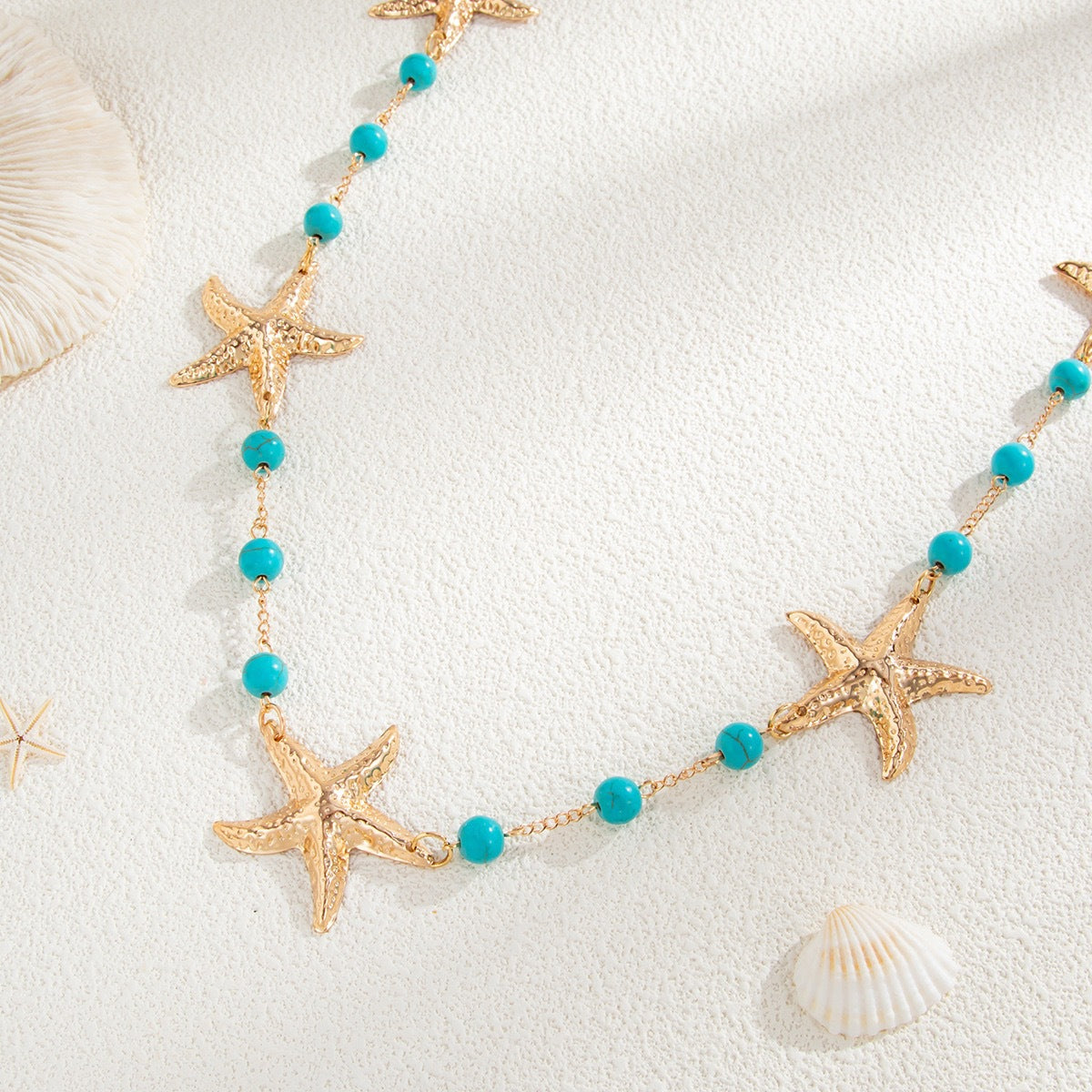 Women’s Gold Starfish Waist Chain with Turquoise Colored Beads
