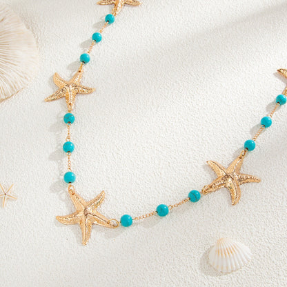 Women’s Gold Starfish Waist Chain with Turquoise Colored Beads