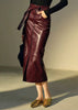 Genuine sheepskin high waisted leather skirt for women. Midi leather skirt with slit and belt. Rich maroon tone adds polish to every leather outfit.