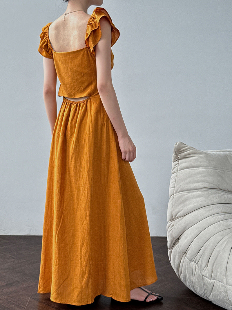 White flutter sleeve linen maxi dress with open back waist fit