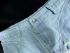 High waisted denim shorts with frayed light wash hem